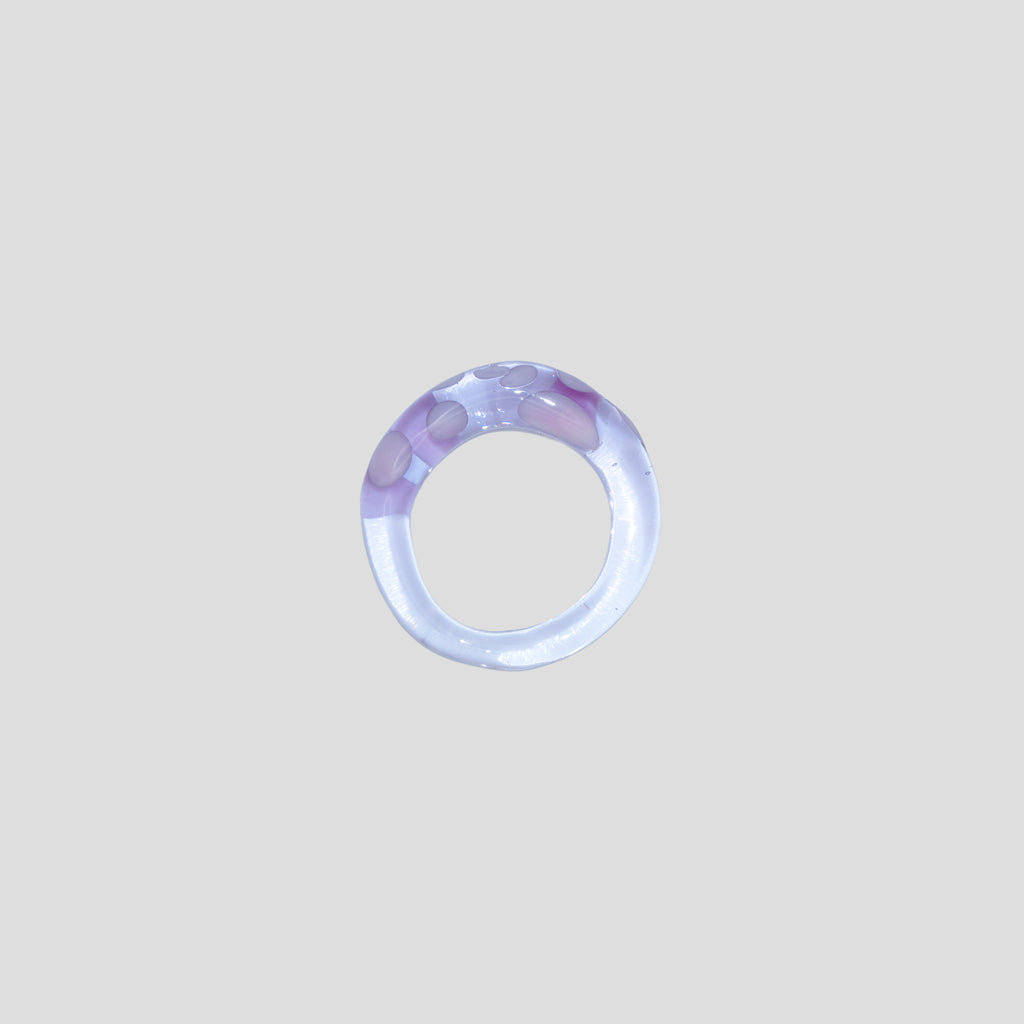 pink clear glass ring on a light gray background from all rivers jewelry